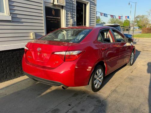 Barcelona Red Metallic 2015 Toyota Corolla LE Plus