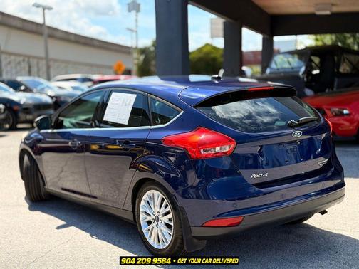 Ruby Red Metallic Tinted Clearcoat 2016 Ford Focus Titanium