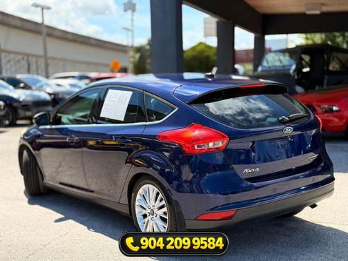 Ruby Red Metallic Tinted Clearcoat 2016 Ford Focus Titanium