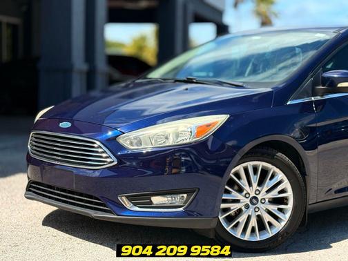 Ruby Red Metallic Tinted Clearcoat 2016 Ford Focus Titanium