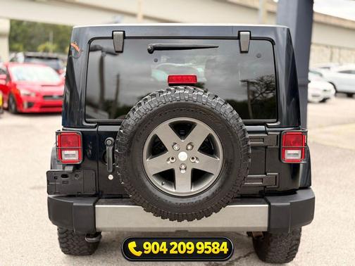 Black Clearcoat 2011 Jeep Wrangler Unlimited Sport