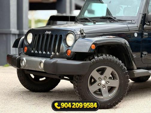 Black Clearcoat 2011 Jeep Wrangler Unlimited Sport