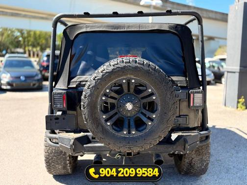 Black Clearcoat 2015 Jeep Wrangler Unlimited Sahara