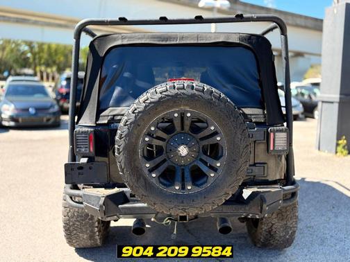 Black Clearcoat 2015 Jeep Wrangler Unlimited Sahara