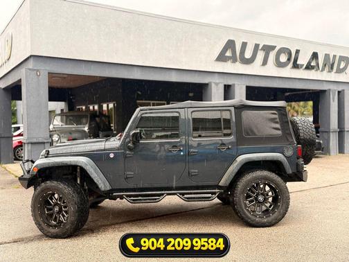Black Clearcoat 2015 Jeep Wrangler Unlimited Sahara