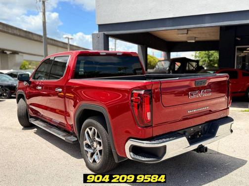 Volcanic Red 2024 GMC Sierra 1500 SLT