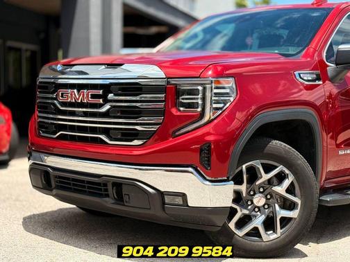 Volcanic Red 2024 GMC Sierra 1500 SLT