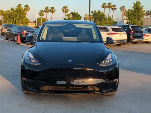 Solid Black 2024 Tesla Model Y Performance Dual Motor All-Wheel Drive