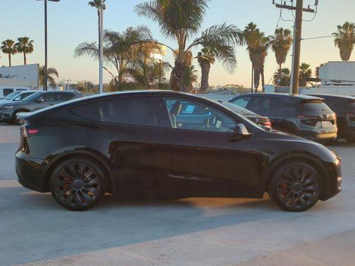 Solid Black 2024 Tesla Model Y Performance Dual Motor All-Wheel Drive