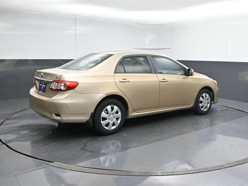 Sandy Beach Metallic 2011 Toyota Corolla LE