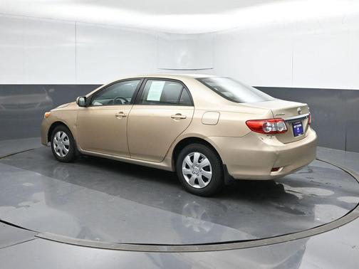 Sandy Beach Metallic 2011 Toyota Corolla LE