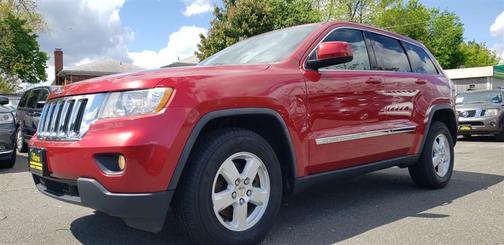Red 2011 Jeep Grand Cherokee Laredo