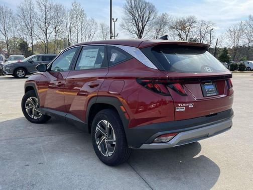 Ultimate Red 2026 Hyundai TUCSON Hybrid Blue SE