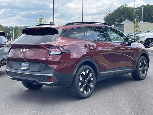 Dawning Red 2023 Kia Sportage X-Line
