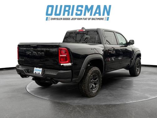 Diamond Black Crystal Pearlcoat 2026 RAM 1500 RHO Crew Cab 4x4 5'7' Box