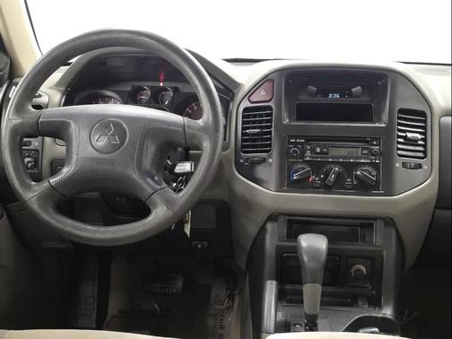 Red 2002 Mitsubishi Montero XLS