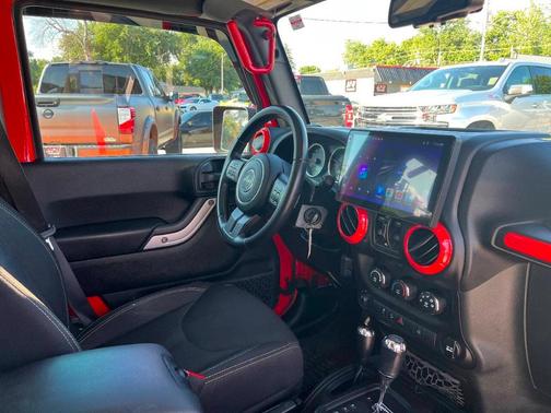 Red 2017 Jeep Wrangler Unlimited Sahara