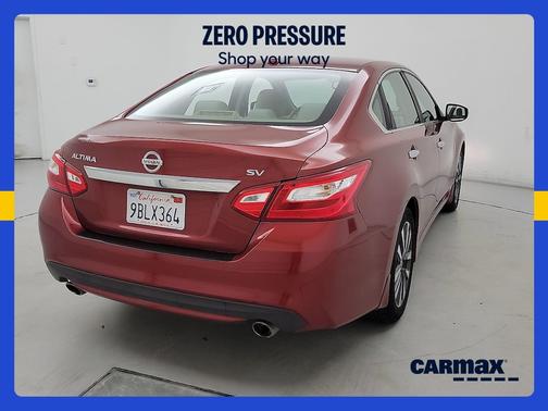 Red 2016 Nissan Altima SV