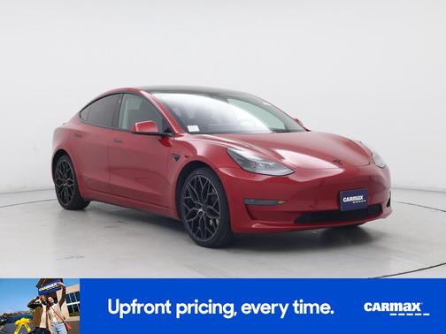 Red 2023 Tesla Model 3