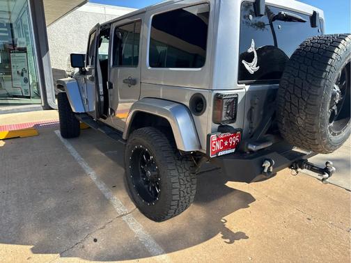 Silver 2015 Jeep Wrangler Unlimited Sahara