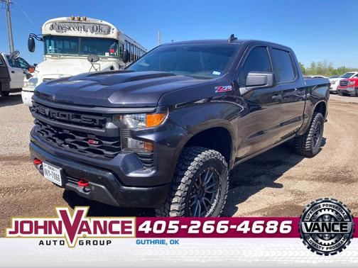 Dark Ash Metallic 2024 Chevrolet Silverado 1500 Custom Trail Boss