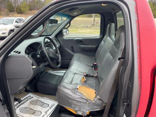 Red 2002 Ford F-150 Short Bed