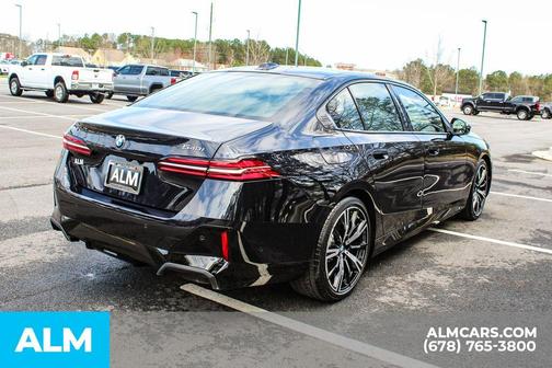 Carbon Black Metallic 2024 BMW 540 i xDrive