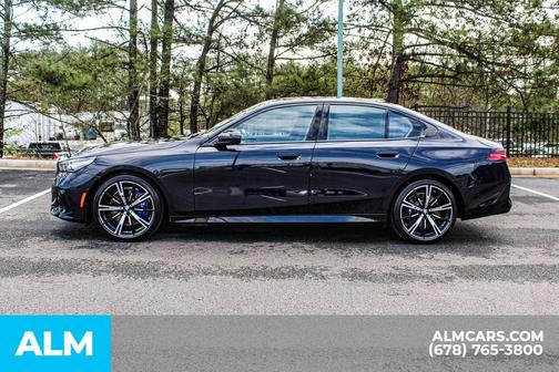 Carbon Black Metallic 2024 BMW 540 i xDrive