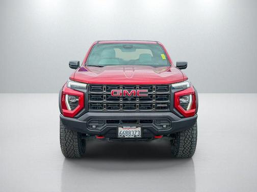 Volcanic Red Tintcoat 2024 GMC Canyon AT4X