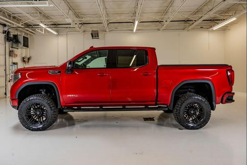 Volcanic Red Tintcoat 2023 GMC Sierra 1500 AT4