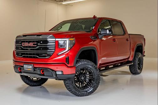 Volcanic Red Tintcoat 2023 GMC Sierra 1500 AT4