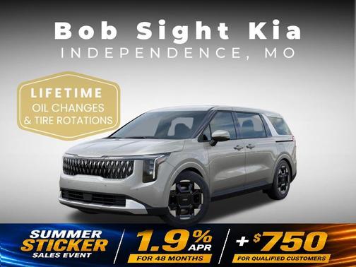 Ivory Silver 2026 Kia Carnival EX