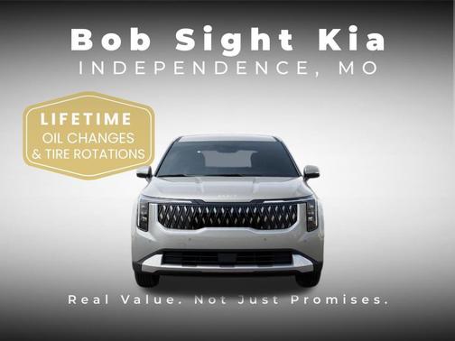 Ivory Silver 2026 Kia Carnival EX
