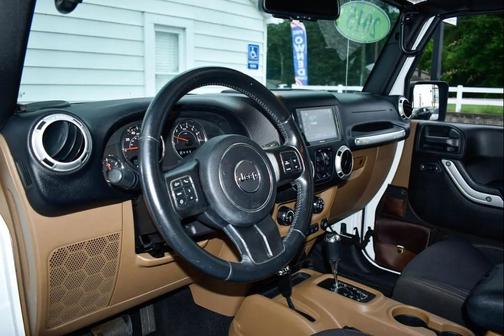 White 2015 Jeep Wrangler Unlimited Sahara