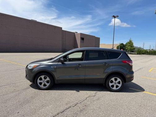 Ruby Red Metallic Tinted Clearcoat 2015 Ford Escape SE