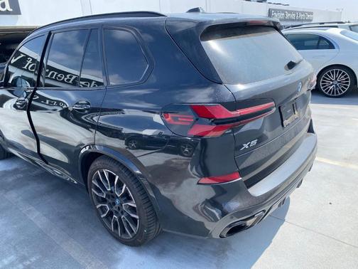 Black Sapphire Metallic 2024 BMW X5 PHEV xDrive50e