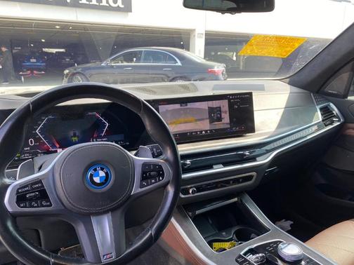Black Sapphire Metallic 2024 BMW X5 PHEV xDrive50e