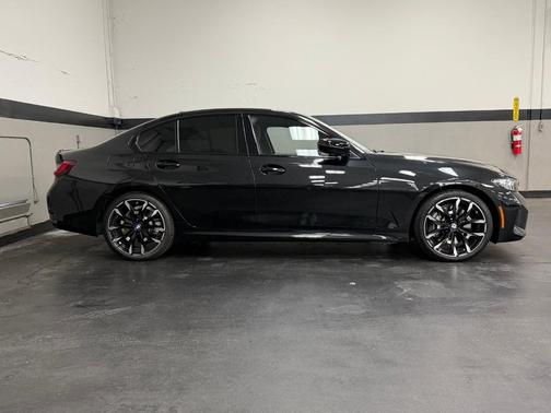 Black Sapphire Metallic 2025 BMW 330 i xDrive