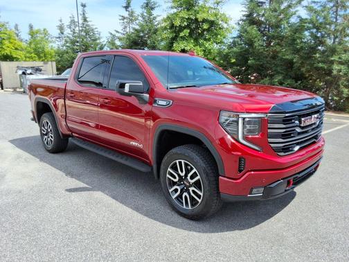 Volcanic Red Tintcoat 2025 GMC Sierra 1500 AT4
