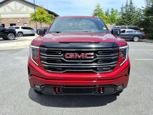 Volcanic Red Tintcoat 2025 GMC Sierra 1500 AT4