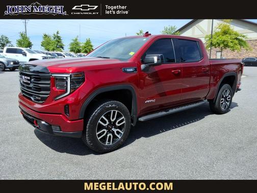 Volcanic Red Tintcoat 2025 GMC Sierra 1500 AT4