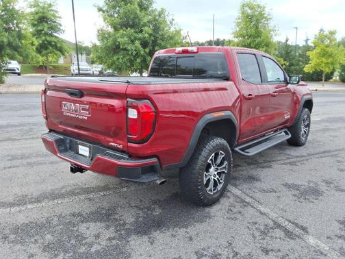 Volcanic Red Tintcoat 2024 GMC Canyon AT4
