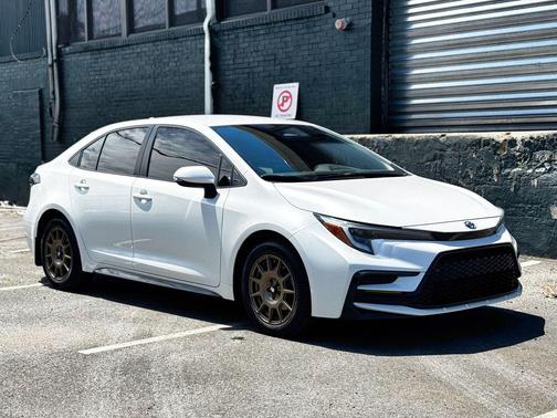 Wind Chill Pearl 2024 Toyota Corolla Hybrid SE