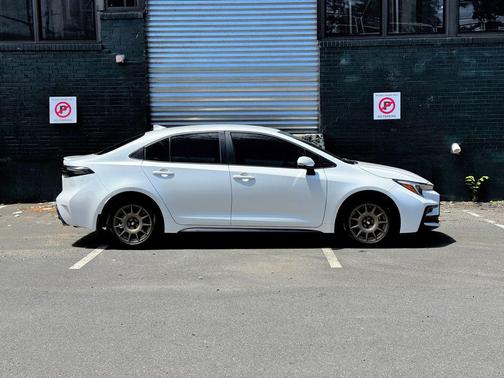 Wind Chill Pearl 2024 Toyota Corolla Hybrid SE