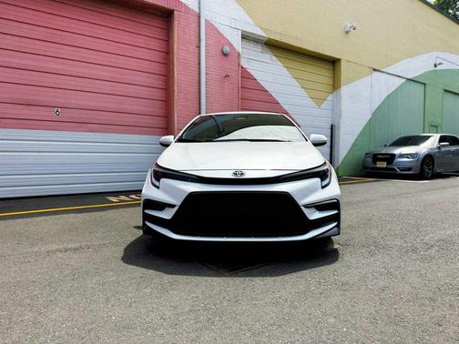 Wind Chill Pearl 2024 Toyota Corolla Hybrid SE