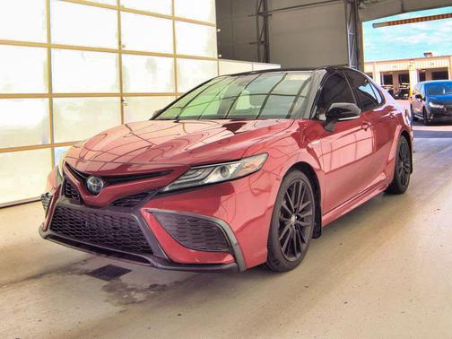 Midnight Black Metallic 2021 Toyota Camry Hybrid SE