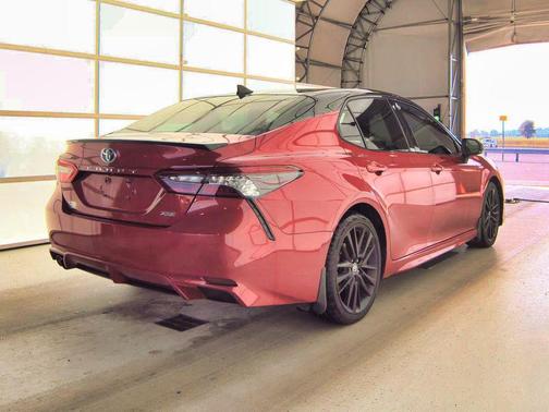 Midnight Black Metallic 2021 Toyota Camry Hybrid SE