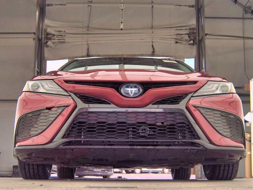 Midnight Black Metallic 2021 Toyota Camry Hybrid SE