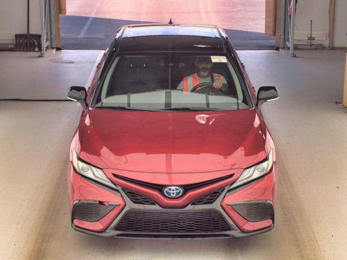 Midnight Black Metallic 2021 Toyota Camry Hybrid SE
