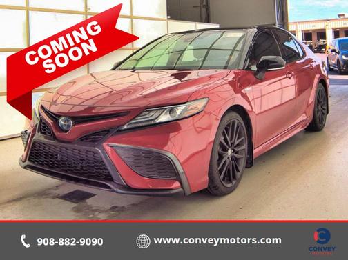 Midnight Black Metallic 2021 Toyota Camry Hybrid SE